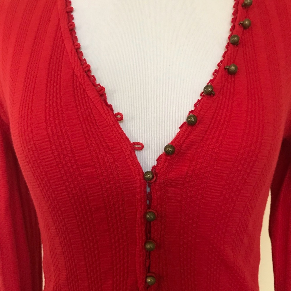Right tight button down Free people top.